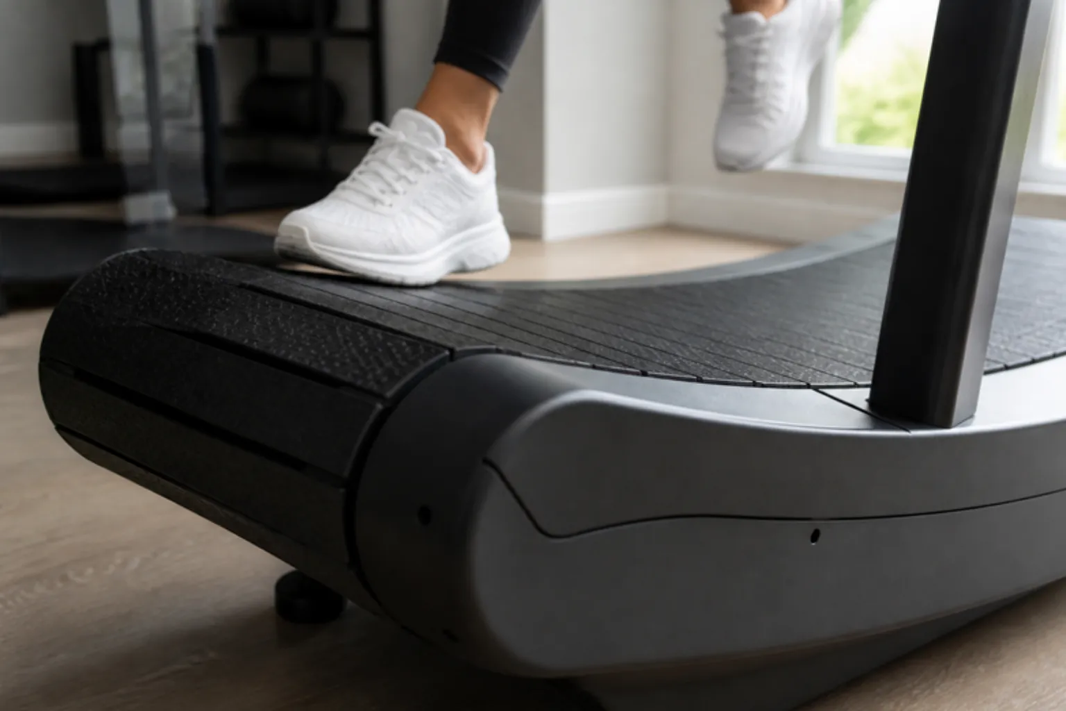 Close-up of a curved treadmill slat deck